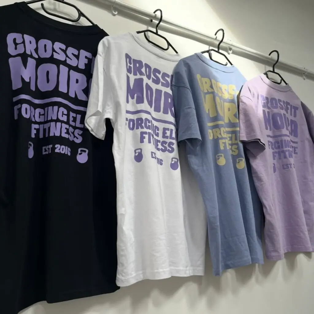 CrossFit Moir T-shirts in four colours hanging on a rail